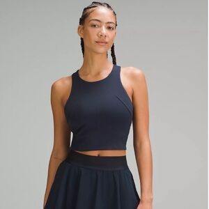 Wunder Train Racerback Tank Top
Medium Support, B/C Cups; size 8; navy